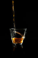 Spiritueux servi dans une tasse Pure de Delissea mettant en valeur les arômes