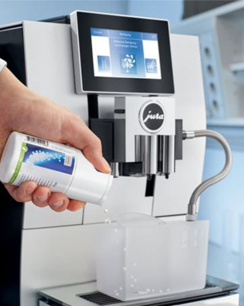 Détergent système lait JURA 90 g – Mini-tabs en action