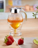 Distributeur de miel Westmark en verre 200 ml, design nid d’abeille avec système de dosage précis.