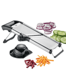 GEFU VOLARI : tranches 1–9 mm, juliennes 4,5/9 mm, molette rotative, poussoir & capuchon sécurité, pieds antidérapants rabattables, insert amovible, lave-vaisselle.