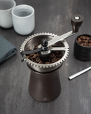 Moulin à café manuel Peugeot Kronos en inox avec 43 réglages de mouture, design moderne et ergonomique.