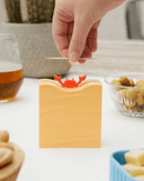 Porte cure-dents crabe Sebastian Balvi avec mécanisme magique, parfait pour surprendre vos invités lors des repas.