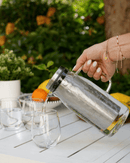 Carafe filtrante AKUA Cookut en verre avec filtration au charbon de coco pour eau pure et sans plastique.

