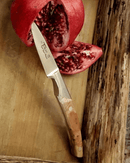 Couteau d’office Le Thiers avec manche en loupe de cade et lame en acier forgé.
