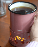 Mug chauffant Sixtea de Cookut avec base bougie, pour thé et café à 60°C, température idéale pour dégustation.