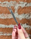 Pic Apéritif Upcycle de Triangle - Accessoire écoresponsable pour piquer olives et tapas