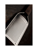 Râpe fine Microplane avec manche en bois de noyer, idéale pour râper agrumes et épices, fabriquée aux USA.